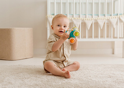 SŁONIK MOBILEK GRZECHOTKA SENSORYCZNA NA KÓŁKACH KORALIKOWA KARUZELA DUMEL