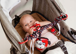 ZAWIESZKA DO WÓZKA SENSORYCZNA KONTRASTOWA KROWA BALIBAZOO LUSTERKO GRYZAK