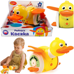 PĘDZĄCA KACZKA NA ŚWIECĄCYCH KÓŁKACH GRA MELODIE MACHA SKRZYDŁAMI DUMEL