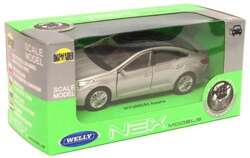 HYUNDAI AZERA METALOWY SAMOCHODZIK KOLEKCJONERSKI WELLY 1:34 SREBNY